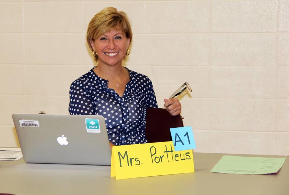 Mrs. Portteus ready to help seniors with their transcript audits.