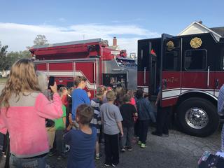 Menominee Students on field trip to fire station.