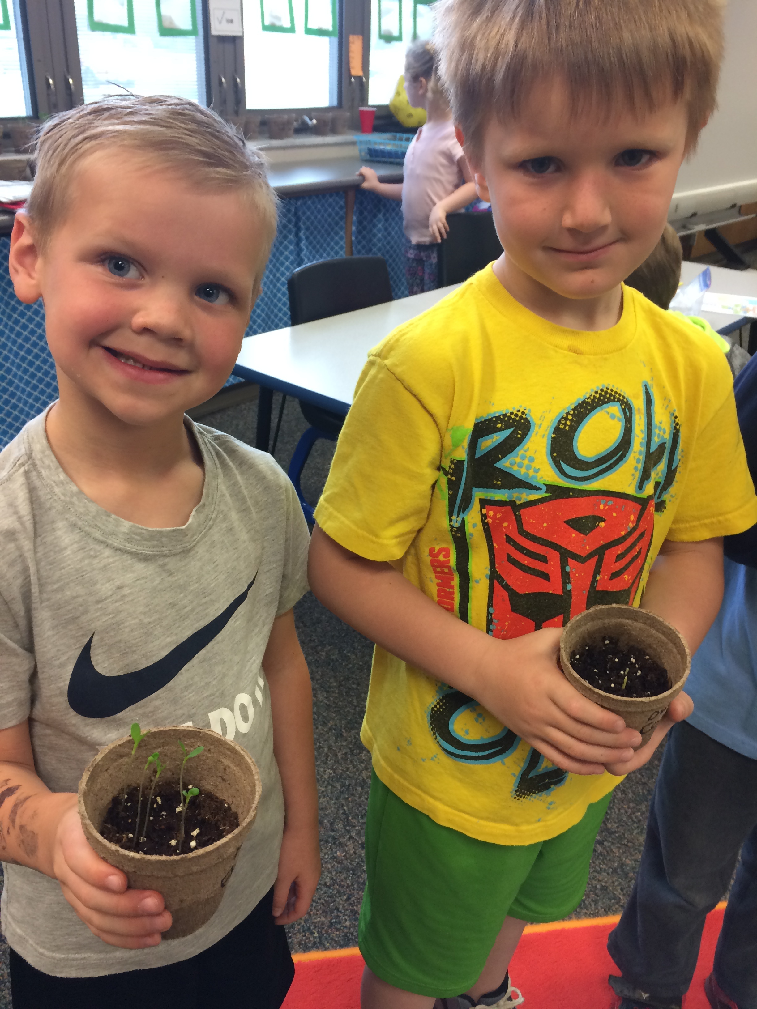 Bradyn Powell and Owen Powell proud of their plants!