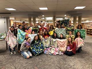 Key Club students with their finished fleece blankets.