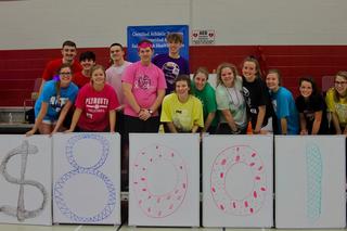 PHS students with LJH students at dance marathon with $8001 dollar amount raised