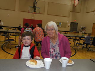 Mornings with Mom event at Menominee- student with motherly figure