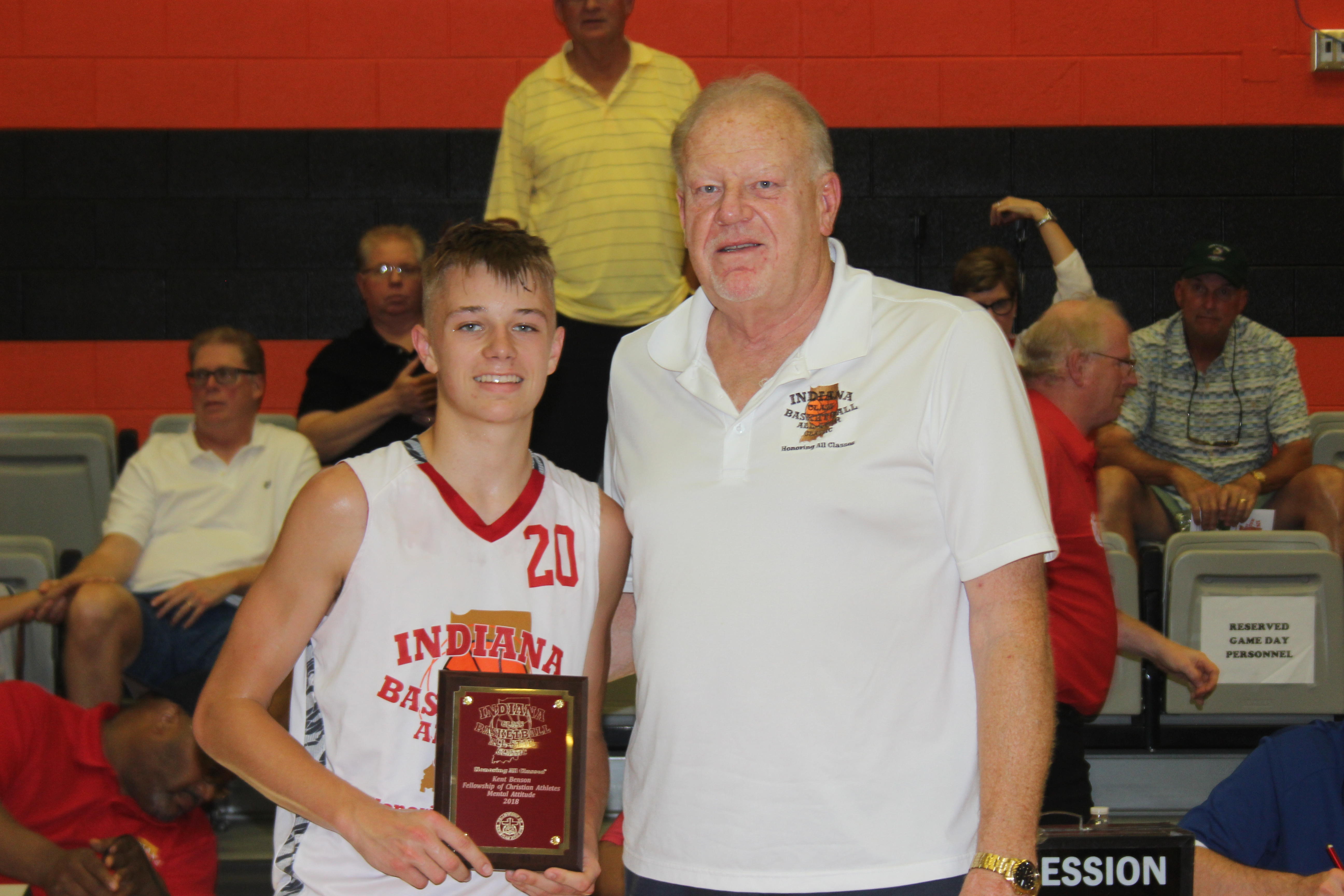 Clay Hilliard received the Kent Benson Fellowship of Christian Athletes Mental Attitude Award at the Indiana Classic All Star Game on June 16. Hilliard scored 8 points in the game. He is pictured with Kent Benson.