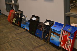 Bat houses that WSOI students painted.