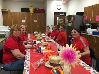 WDA staff wears red for education.