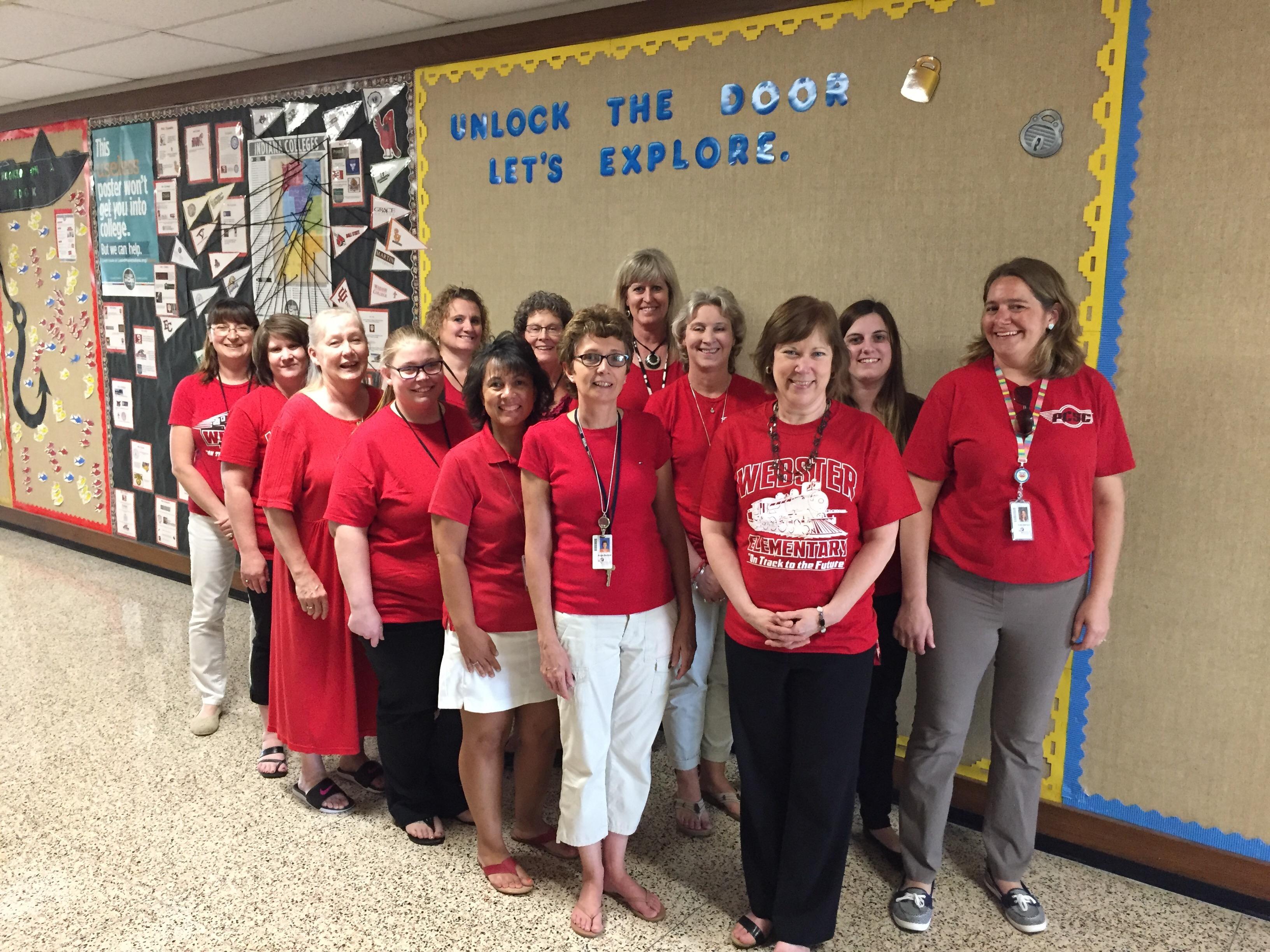 Webster staff wearing red for education.